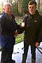 Bob Roberts awarding his grandson the Hendon Air rifle 25m Div 4 Benchrest Trophy