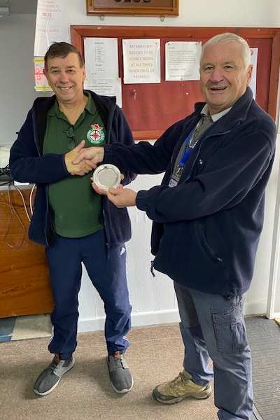 Derek Sainsbury receiving his trophy for winning division 1 in Benchrest air